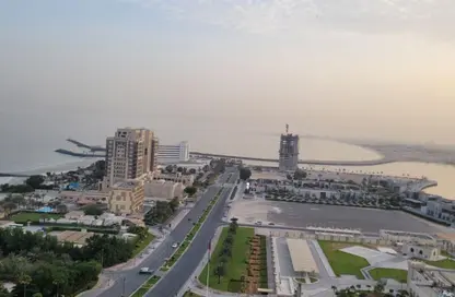 Apartment - 1 Bedroom - 2 Bathrooms for rent in Corniche Tower - Ajman Corniche Road - Ajman