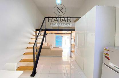 Apartment - Studio - 1 Bathroom for rent in Plazzo Heights - District 10 - Jumeirah Village Circle - Dubai