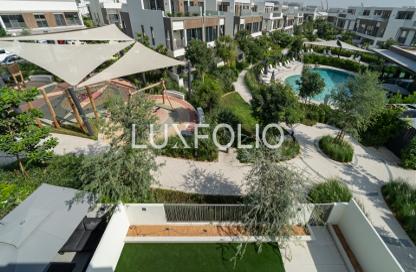 Villa - 4 Bedrooms - 6 Bathrooms for sale in Aura Gardens - Tilal Al Ghaf - Dubai