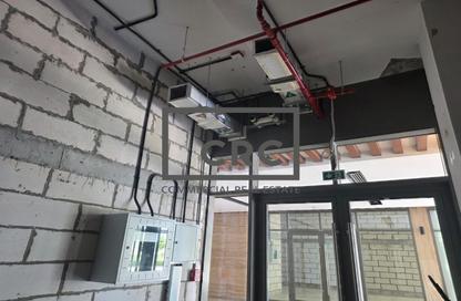 Retail - Studio - 1 Bathroom for rent in Farhad Azizi Residence - Dubai Healthcare City 2 - Al Jaddaf - Dubai