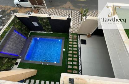 Villa - 5 - 7 for sale in Al Helio Downtown - Al Helio - Ajman