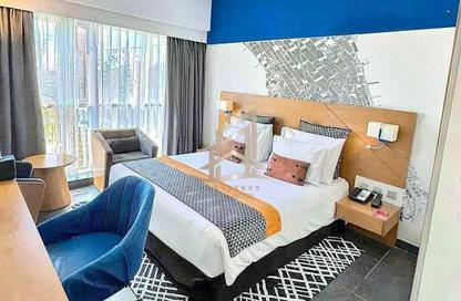 Apartment - Studio - 1 for sale in Tryp by Wyndham - Barsha Heights (Tecom) - Dubai