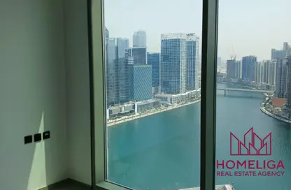 شقة - غرفة نوم - 1 حمام للايجار في بنينسولا ثري - بنينسولا - الخليج التجاري - دبي