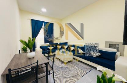 Apartment - 1 Bedroom - 1 Bathroom for rent in Corniche Tower - Ajman Corniche Road - Ajman
