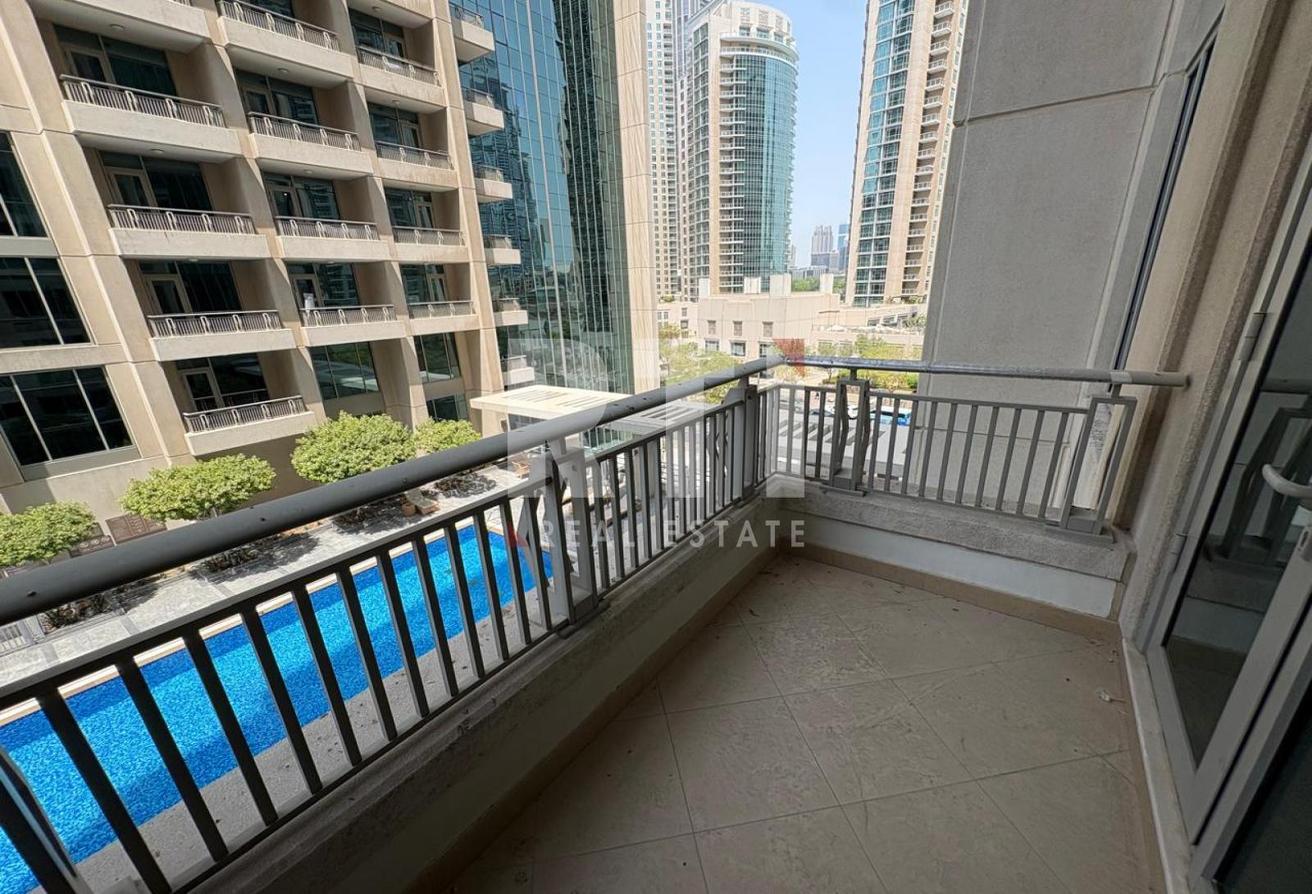 DOWNTOWN LIVING | SWIMMING POOL VIEW | UNFURNISHED photo 2