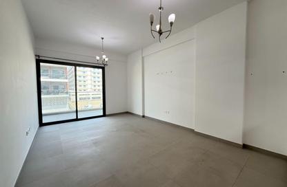 Apartment - 1 Bedroom - 2 Bathrooms for rent in Prestige Building - International City Phase 2 - Al Warsan 4 - Al Warsan - Dubai