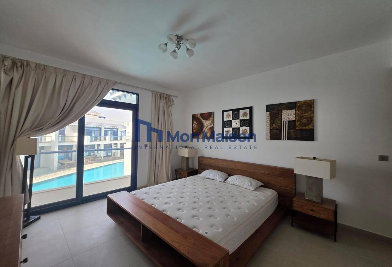 FULLY FURNISHED | SPACIOUS LIVING AREA | POOL VIEW photo 7