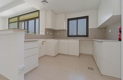 Townhouse - 3 - 4 for sale in Noor Townhouses - Town Square - Dubai