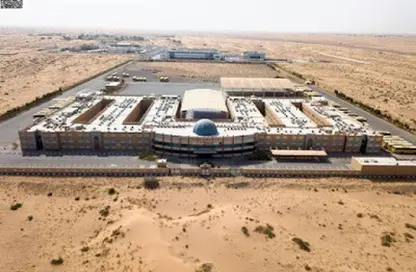 أرض - استوديو للبيع في العذيب - ضاحية الرويضات - الشارقة