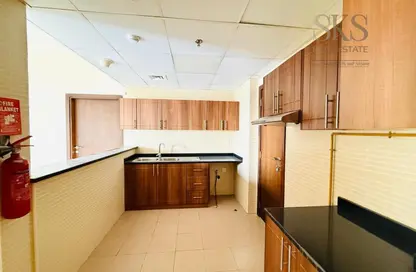 Apartment - 1 Bedroom - 2 Bathrooms for rent in Remal Tower - District 13 - Jumeirah Village Circle - Dubai