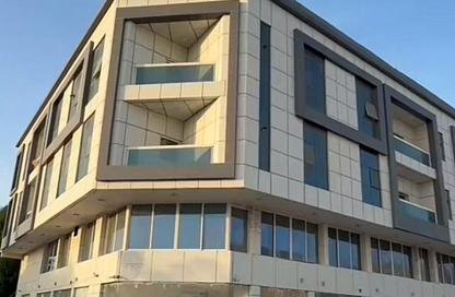 عمارة بالكامل - استوديو - 8 حمامات للبيع في 2 المويهات - المويهات - عجمان