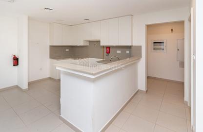 Townhouse - 3 - 4 for sale in Noor Townhouses - Town Square - Dubai
