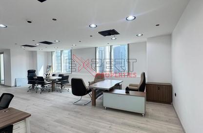 Office Space - Studio - 2 Bathrooms for rent in The Prism - Business Bay - Dubai
