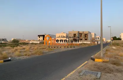 أرض - استوديو للبيع في بساتين الزبير - الرحمانية - الشارقة