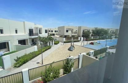 Townhouse - 4 - 4 for rent in Noor Townhouses - Town Square - Dubai