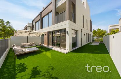 Villa - 4 - 5 for sale in Aura Gardens - Tilal Al Ghaf - Dubai