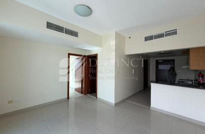 Apartment - 1 Bedroom - 2 Bathrooms for rent in Cricket Tower - Dubai Sports City - Dubai
