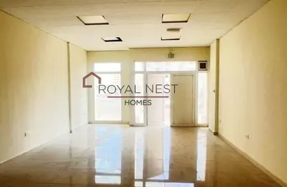 متجر - استوديو - 1 حمام للايجار في زد04 - طراز إنجليزي - المدينة العالمية - دبي