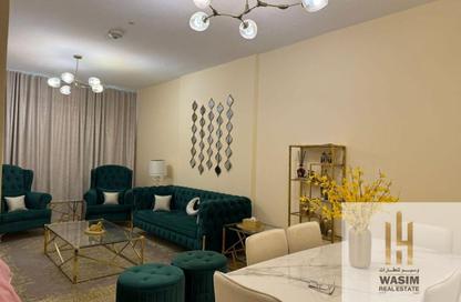 Apartment - 1 Bedroom - 2 Bathrooms for sale in Orient Towers - Al Bustan - Ajman