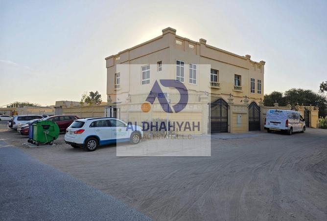 Two two-story villas for sale in Al Ghafia; corner
