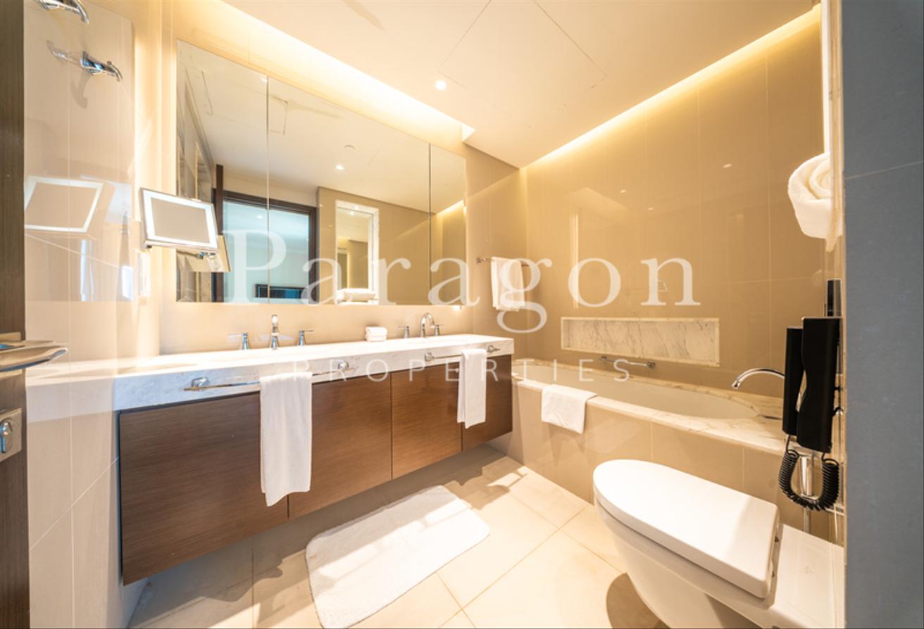 Burj View | Elegant Living | Prime Location photo 12