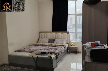 Apartment - 2 Bedrooms - 2 Bathrooms for sale in Orient Tower 1 - Orient Towers - Al Bustan - Ajman