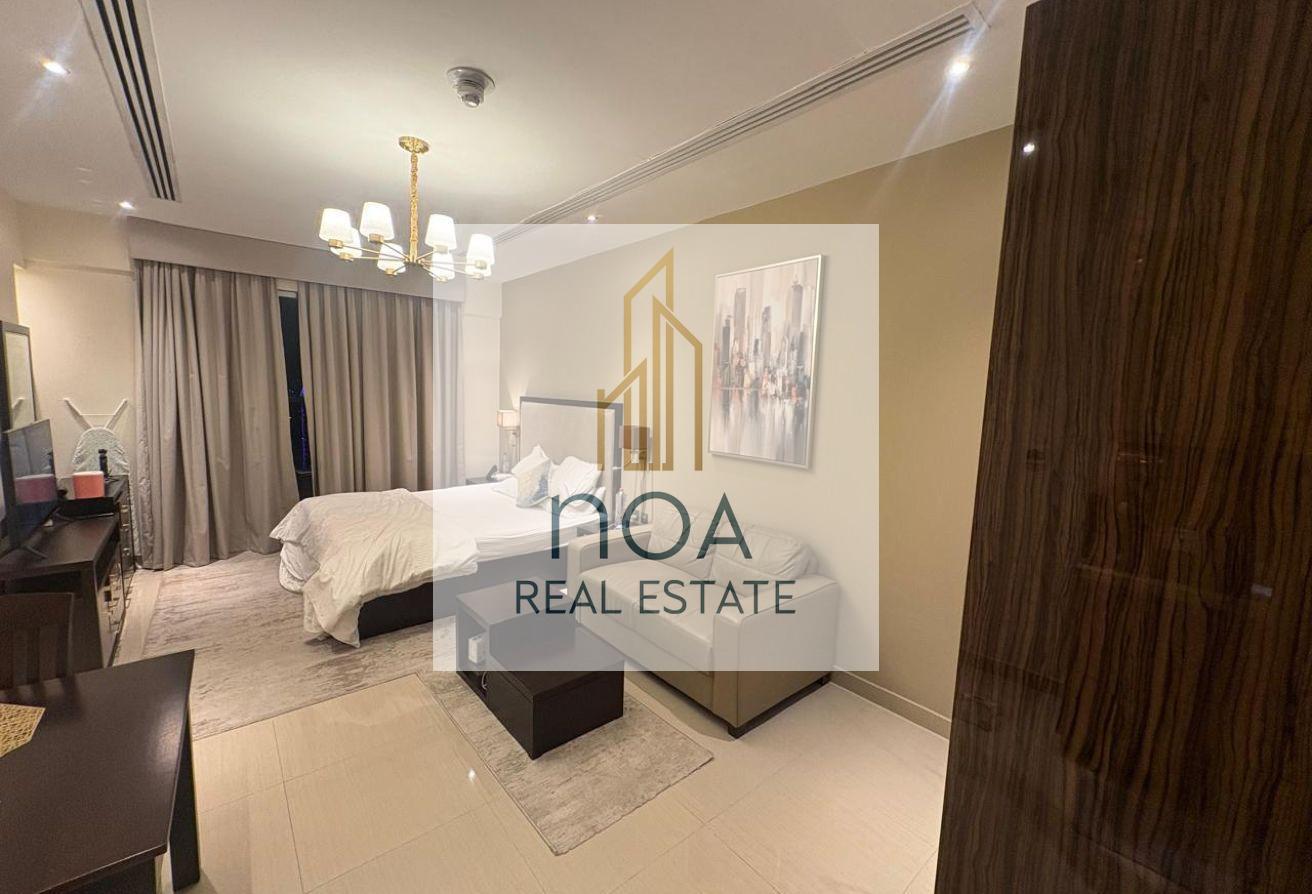 Furnished Studio | High Floor | skyline view photo 12