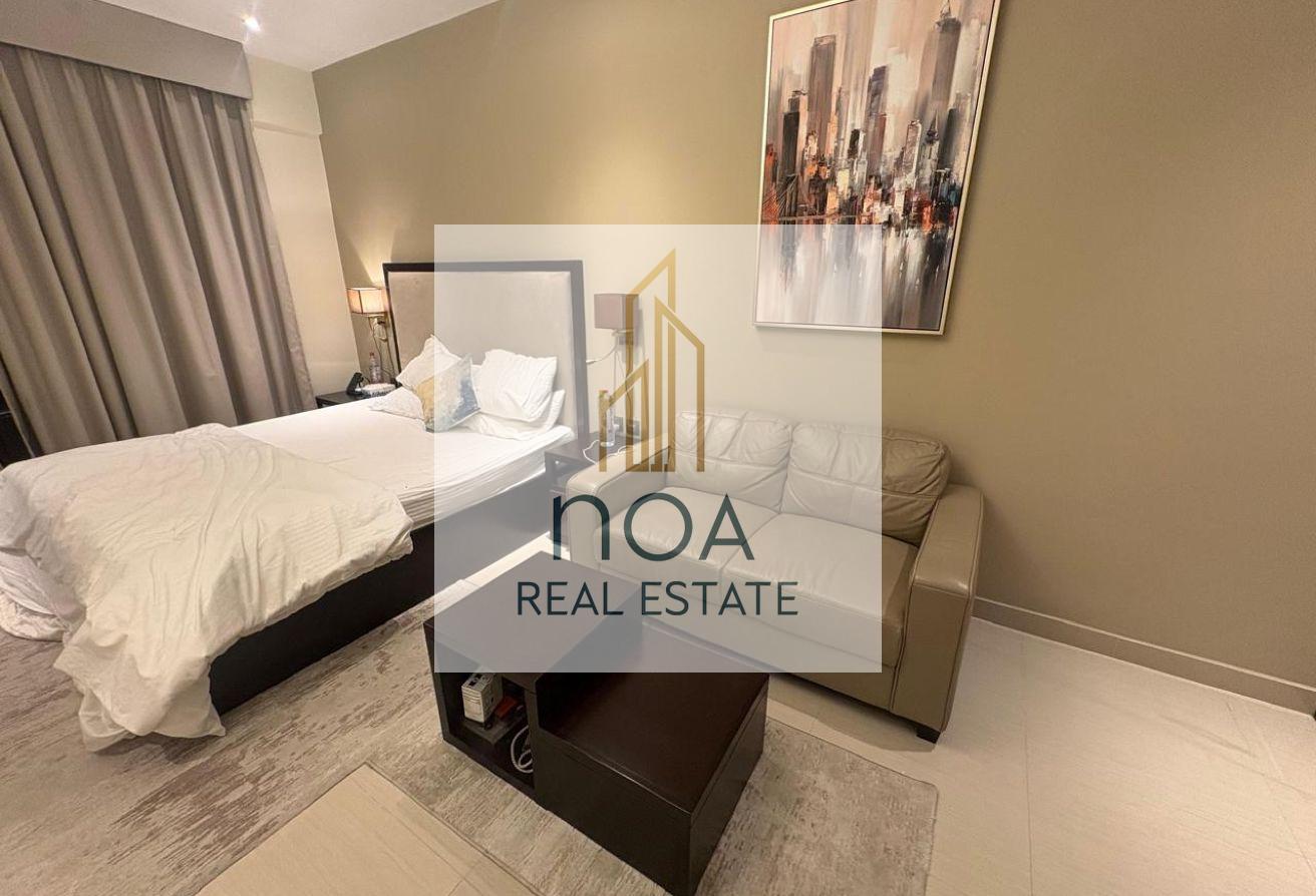 Furnished Studio | High Floor | skyline view photo 11