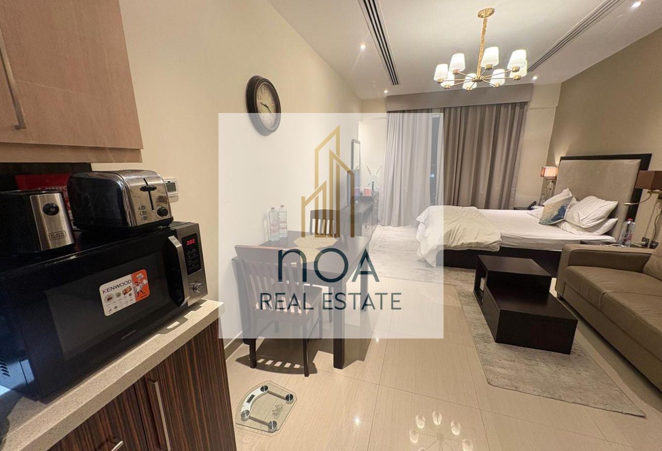 Furnished Studio | High Floor | skyline view photo 13