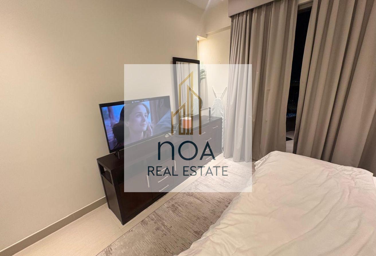 Furnished Studio | High Floor | skyline view photo 9