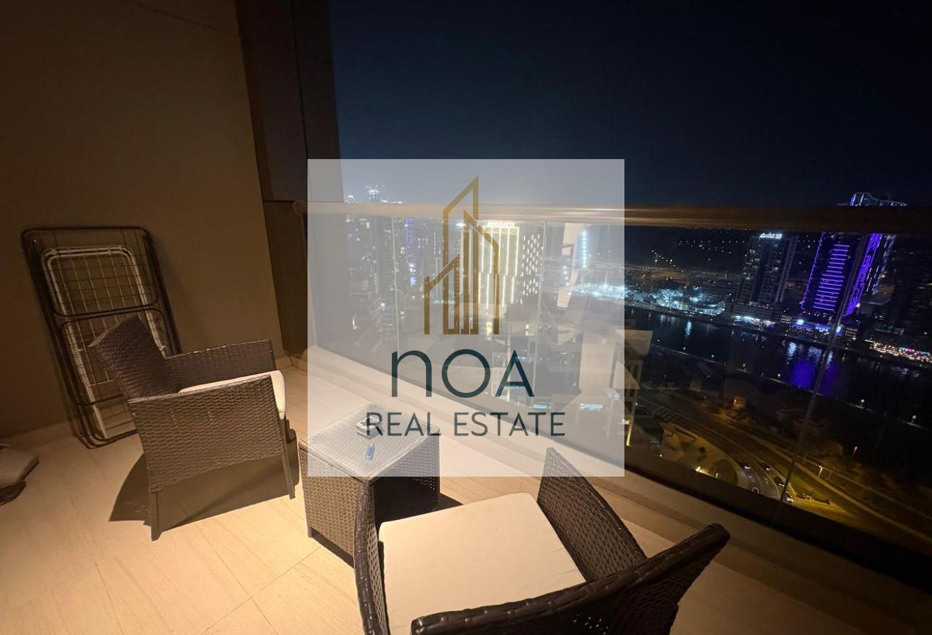 Furnished Studio | High Floor | skyline view photo 3