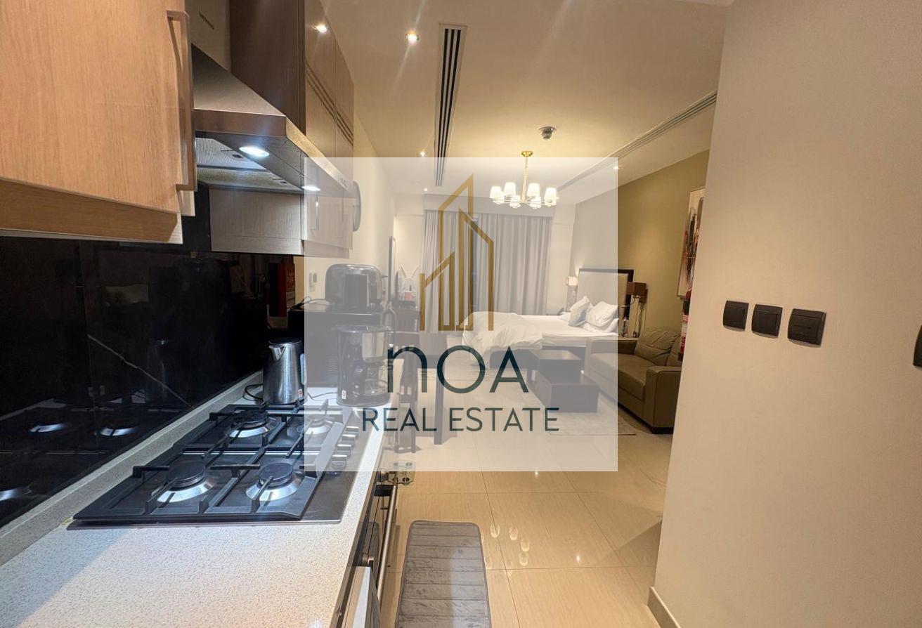 Furnished Studio | High Floor | skyline view photo 14
