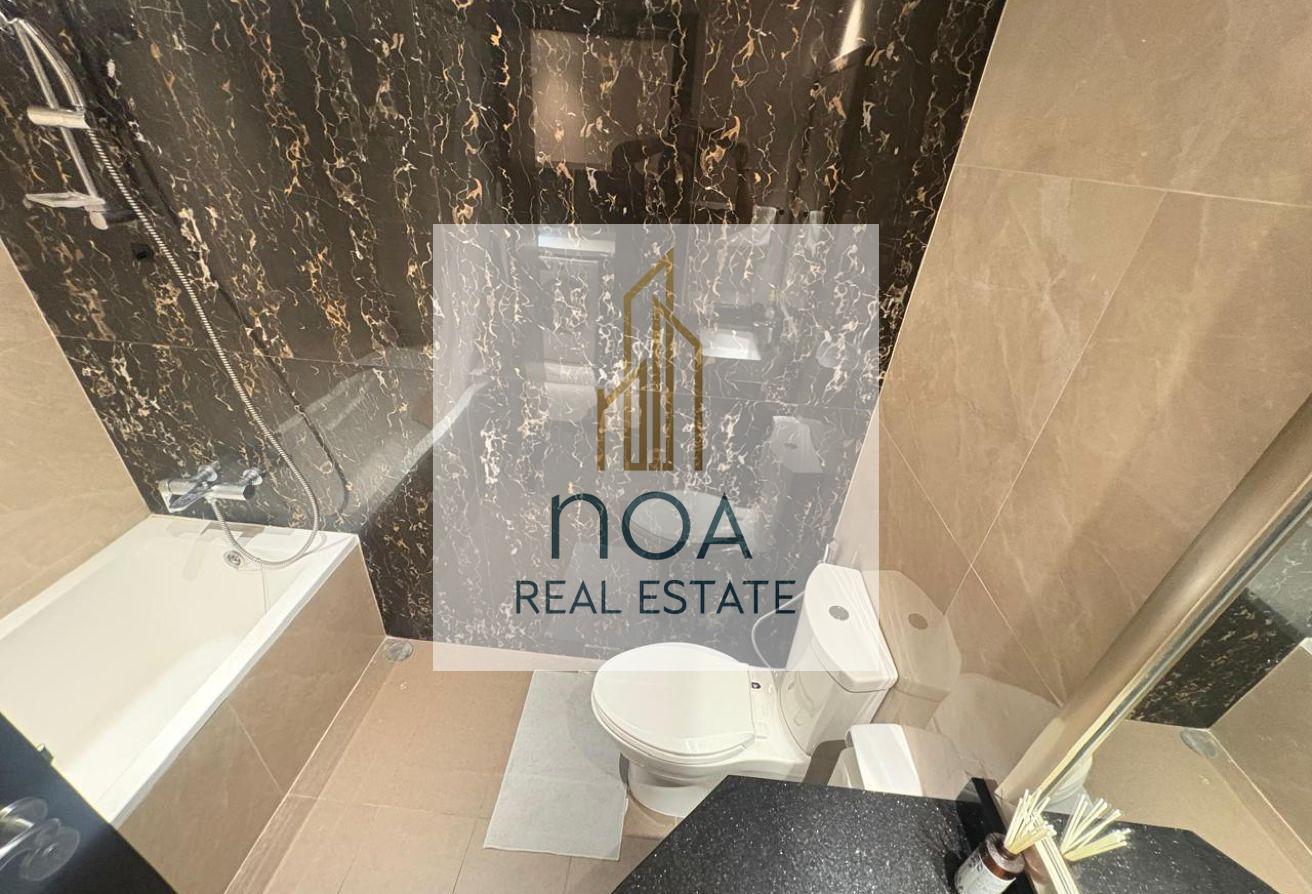 Furnished Studio | High Floor | skyline view photo 16