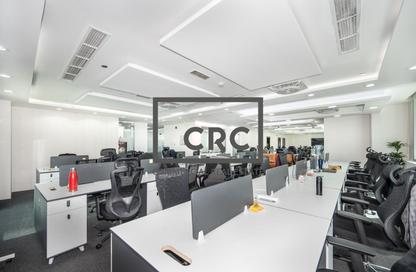 Office Space - Studio - 2 Bathrooms for rent in The Prism - Business Bay - Dubai