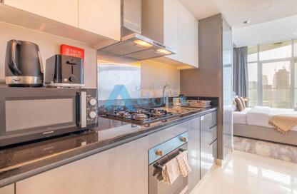 Apartment - Studio - 1 for rent in Damac Maison Prive B - Damac Maison Prive - Business Bay - Dubai