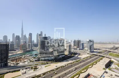 شقة - 1 حمام للايجار في رأسًا على عقب - الخليج التجاري - دبي