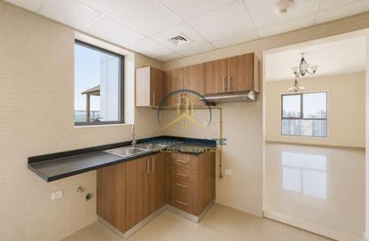 Apartment - 1 Bedroom - 1 Bathroom for rent in Remal Tower - District 13 - Jumeirah Village Circle - Dubai
