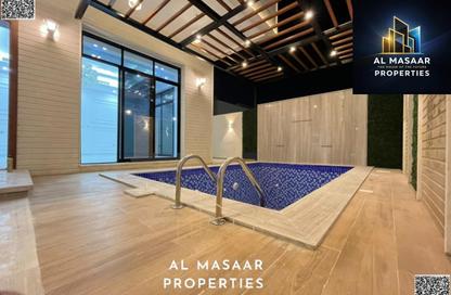Villa - 5 Bedrooms - 7 Bathrooms for sale in Al Helio 2 - Al Helio - Ajman
