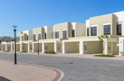 Townhouse - 3 - 4 for rent in Noor Townhouses - Town Square - Dubai
