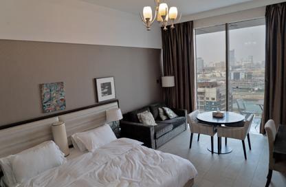 Apartment - Studio - 1 Bathroom for rent in Giovanni Boutique Suites - Dubai Sports City - Dubai