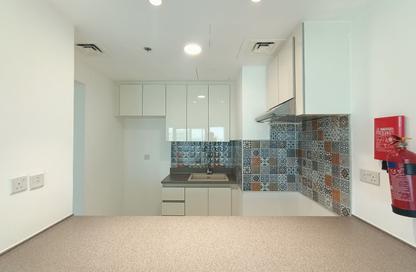Apartment - 1 Bedroom - 2 Bathrooms for rent in Rabdan Building - Motor City - Dubai