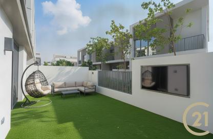 Townhouse - 4 - 5 for rent in Aura Gardens - Tilal Al Ghaf - Dubai
