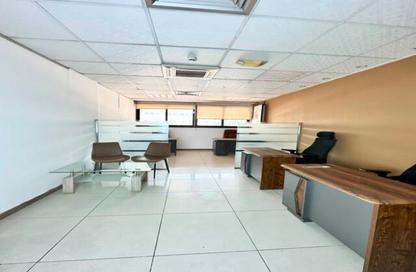 Business Centre - Studio - 2 Bathrooms for rent in Al Kazim Building - Karama Park Area - Al Karama - Dubai