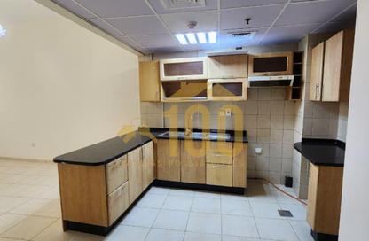 Apartment - 1 - 2 for rent in Global Green View - CBD (Central Business District) - International City - Dubai