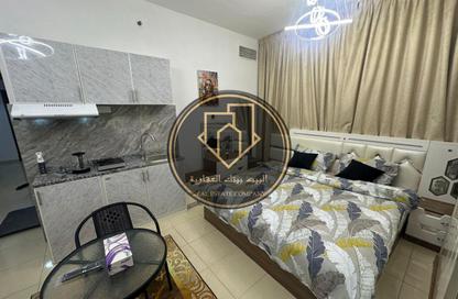 Apartment - 2 Bedrooms - 3 Bathrooms for sale in Orient Tower 1 - Orient Towers - Al Bustan - Ajman