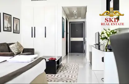 شقة - 1 حمام للايجار في جيوفاني بوتيك سويتس - مدينة دبي الرياضية - دبي