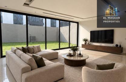 Villa - 4 - 5 for sale in Golf Community - Al Zorah - Ajman