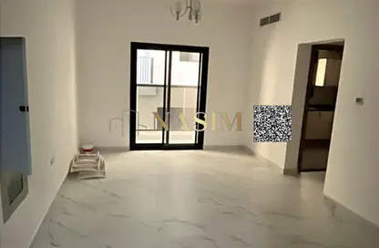 Apartment - 1 Bedroom - 1 Bathroom for rent in Orchid Towers - Tiger Downtown Ajman - Al Alia - Ajman