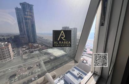 Apartment - 2 Bedrooms - 3 Bathrooms for rent in Corniche Tower - Ajman Corniche Road - Ajman