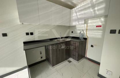 Apartment - 1 Bedroom - 2 Bathrooms for rent in Rukan Residence - Rukan - Dubai